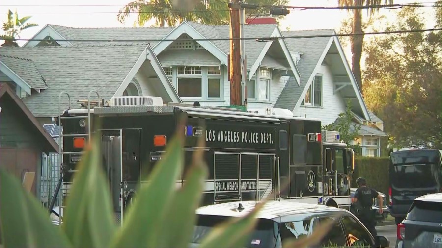 A suspect was taken into custody after an hours-long SWAT standoff following a deadly shooting in the Jefferson Park neighborhood of South Los Angeles on Aug. 23, 2025. (KTLA)