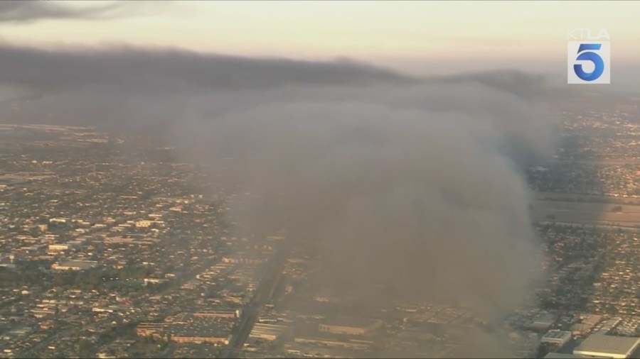 Large plumes of toxic smoke billowed into the sky and covered nearby communities on Aug. 6, 2025. (KTLA)