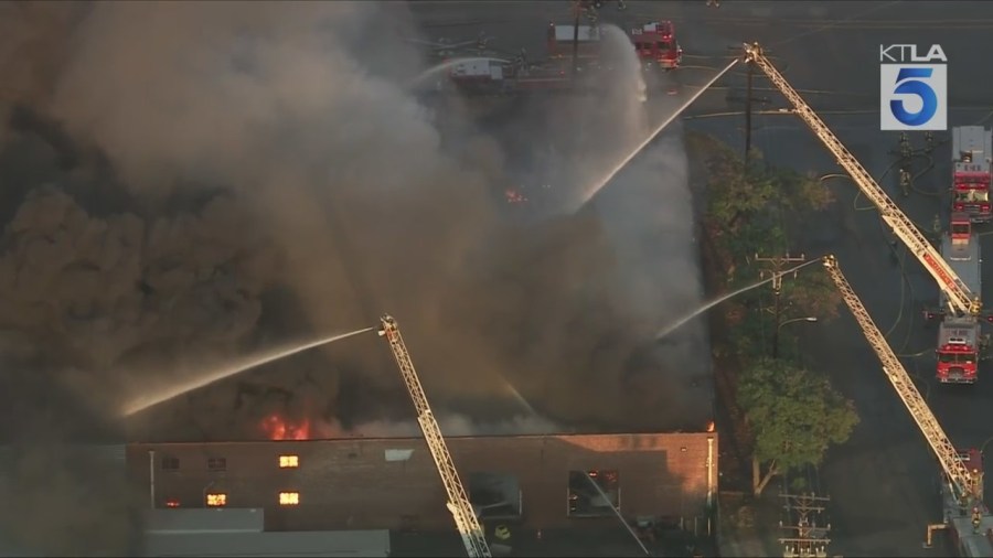 Crews battled a large fire at a commercial building that was reportedly filled with e-bikes in Commerce on Aug. 6, 2025. (KTLA)