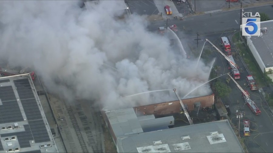 Crews battled a large fire at a commercial building that was reportedly filled with e-bikes in Commerce on Aug. 6, 2025. (KTLA)