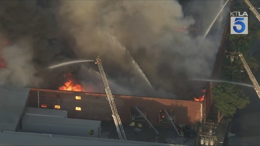 Crews battled a large fire at a commercial building that was reportedly filled with e-bikes in Commerce on Aug. 6, 2025. (KTLA)