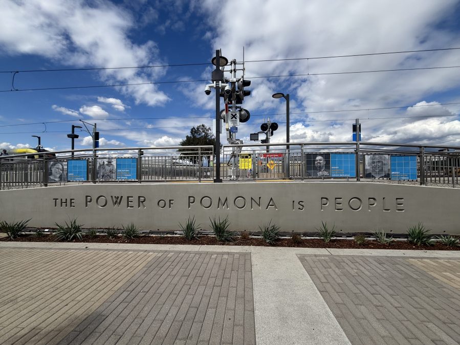 "The Power of Pomona is People" slogan is seen carved into a concrete wall at the new Pomona North Station on Sept. 19, 2025. (Travis Schlepp)