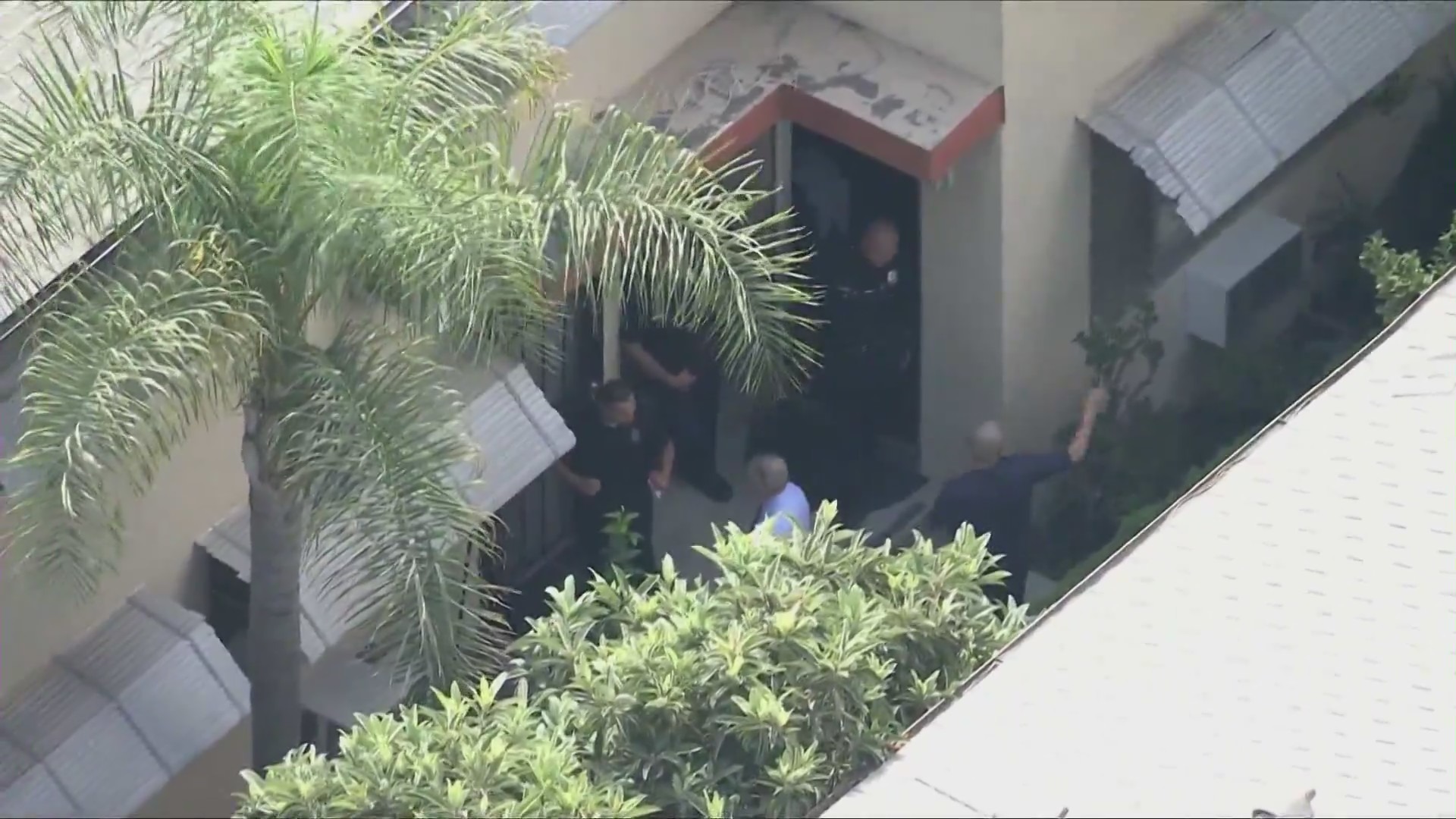 Los Angeles police officers respond for a report of a residential shooting in North Hollywood on Sept. 12, 2025. (KTLA)