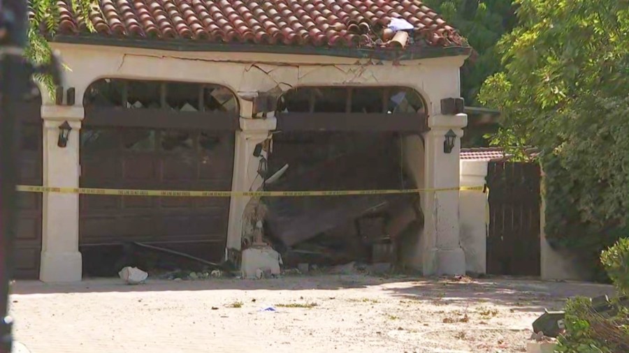 A driver who was fleeing police in a stolen vehicle was killed after crashing into a home in South Pasadena on Sept. 19, 2025. (KTLA)