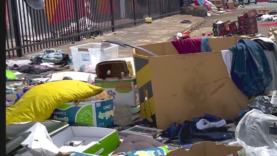 Streets near the Wholesale Produce District in downtown Los Angeles are often lined with rotting food and produce that was illegally dumped, an issue that locals say has been ongoing for years. (KTLA)