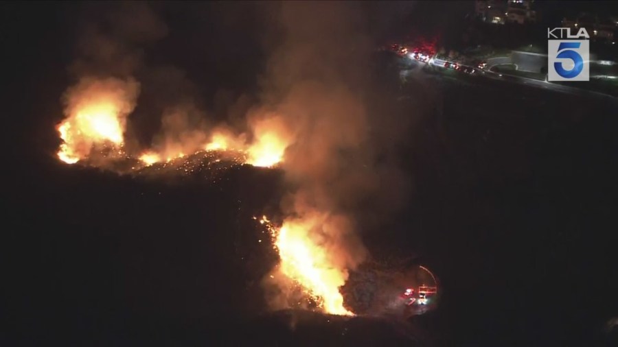 Evacuation orders have been issued as a fast-moving brush fire burns in Jurupa Valley in Riverside County on Sept. 5, 2025. (KTLA)