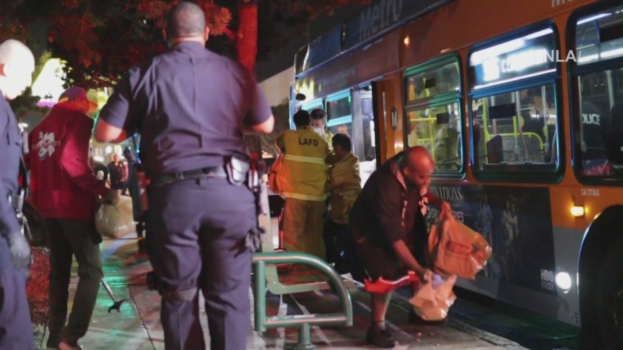 LAPD respond to a Westchester intersection where an 18-year-old woman was shot to death by a suspect while riding a Metro bus on Aug. 22, 2025. (TNLA)