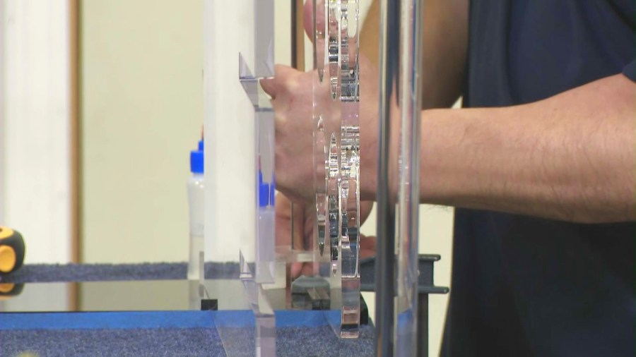 Ray Tissan's polycarbonate unbreakable glass product is helping deter burglars and theives by protecting customer's merchandise and stores. (KTLA)