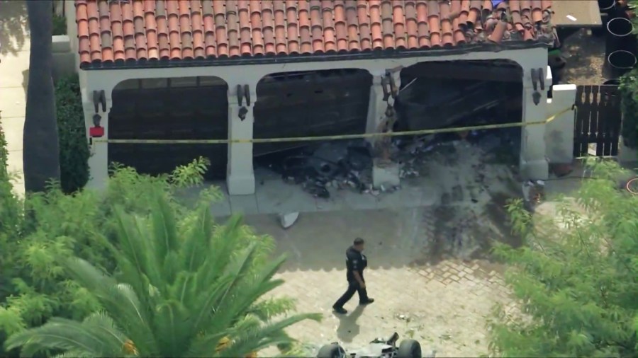 A driver who was fleeing police in a stolen vehicle was killed after crashing into a home in South Pasadena on Sept. 19, 2025. (KTLA)