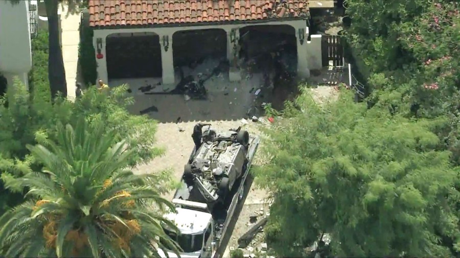 A driver who was fleeing police in a stolen vehicle was killed after crashing into a home in South Pasadena on Sept. 19, 2025. (KTLA)