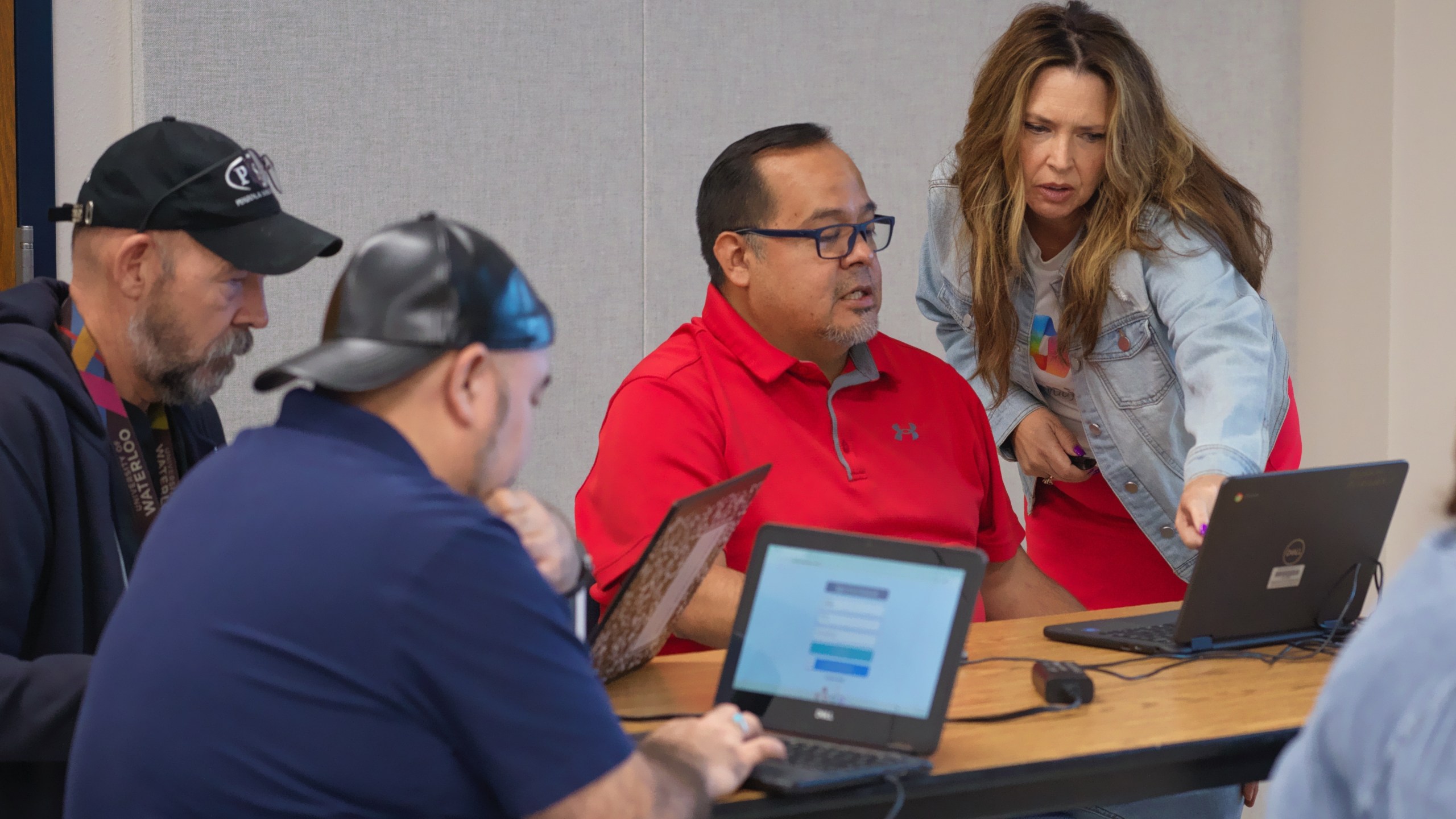 Dr. Geri Gillespy, Microsoft industry advisor, right, speaks with attendees during a Microsoft AI skilling event, Saturday, Sept. 27, 2025, in San Antonio. (AP Photo/Darren Abate)