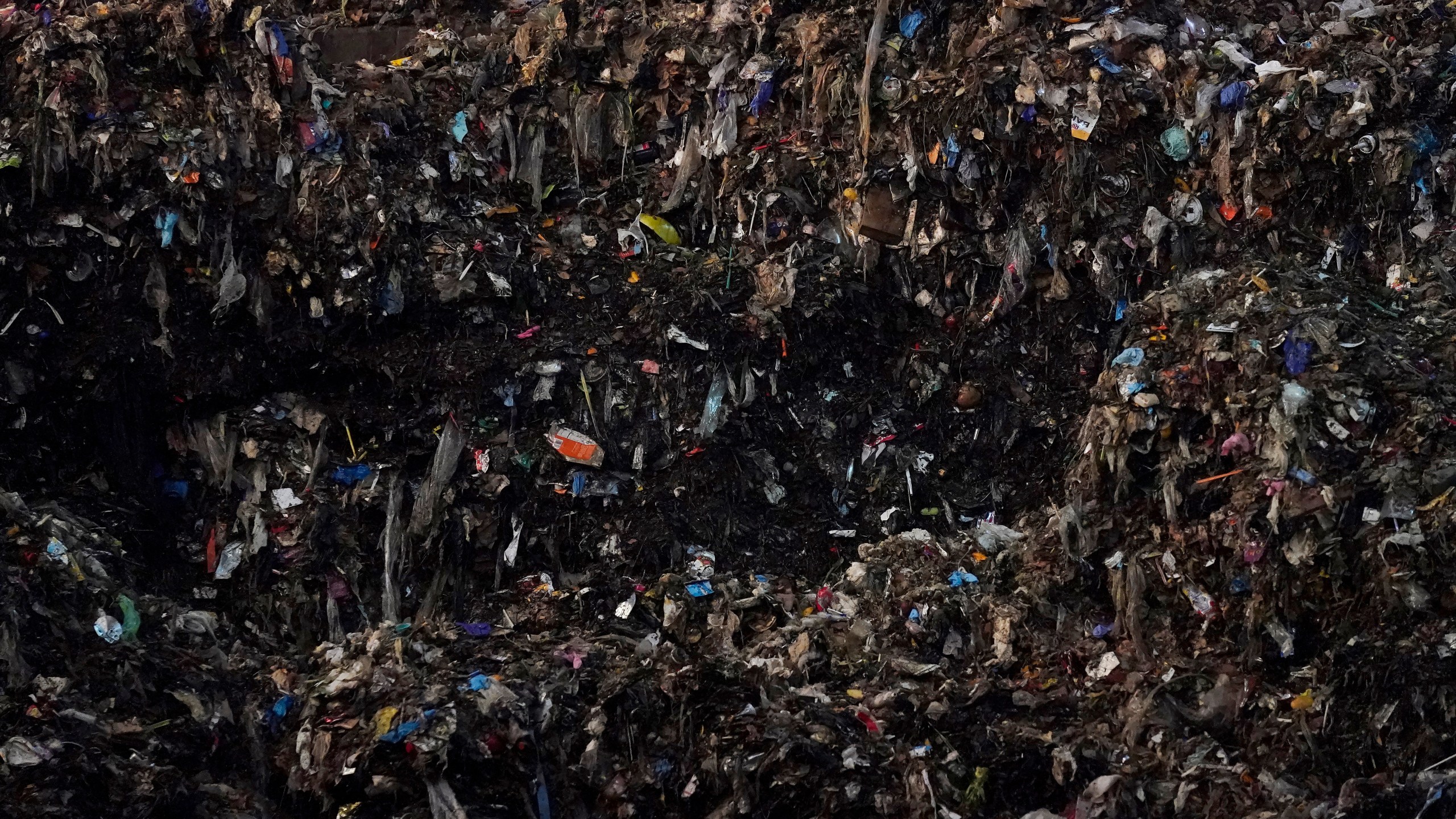 FILE - Shredded organic materials are piled up at a GreenWaste Renewable Energy Digestion Facility in San Jose, Calif., Oct. 27, 2023. (AP Photo/Jeff Chiu, File)
