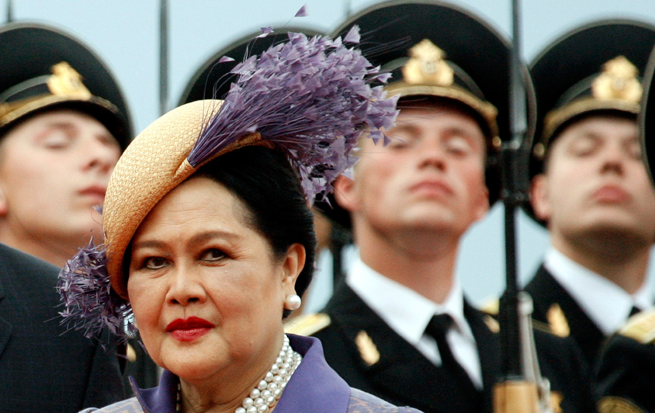 FILE - Queen Mother Sirikit passes by Russian honor guards while arriving in Moscow Vnukovo airport, July 2, 2007. (AP Photo/Misha Japaridze, File)