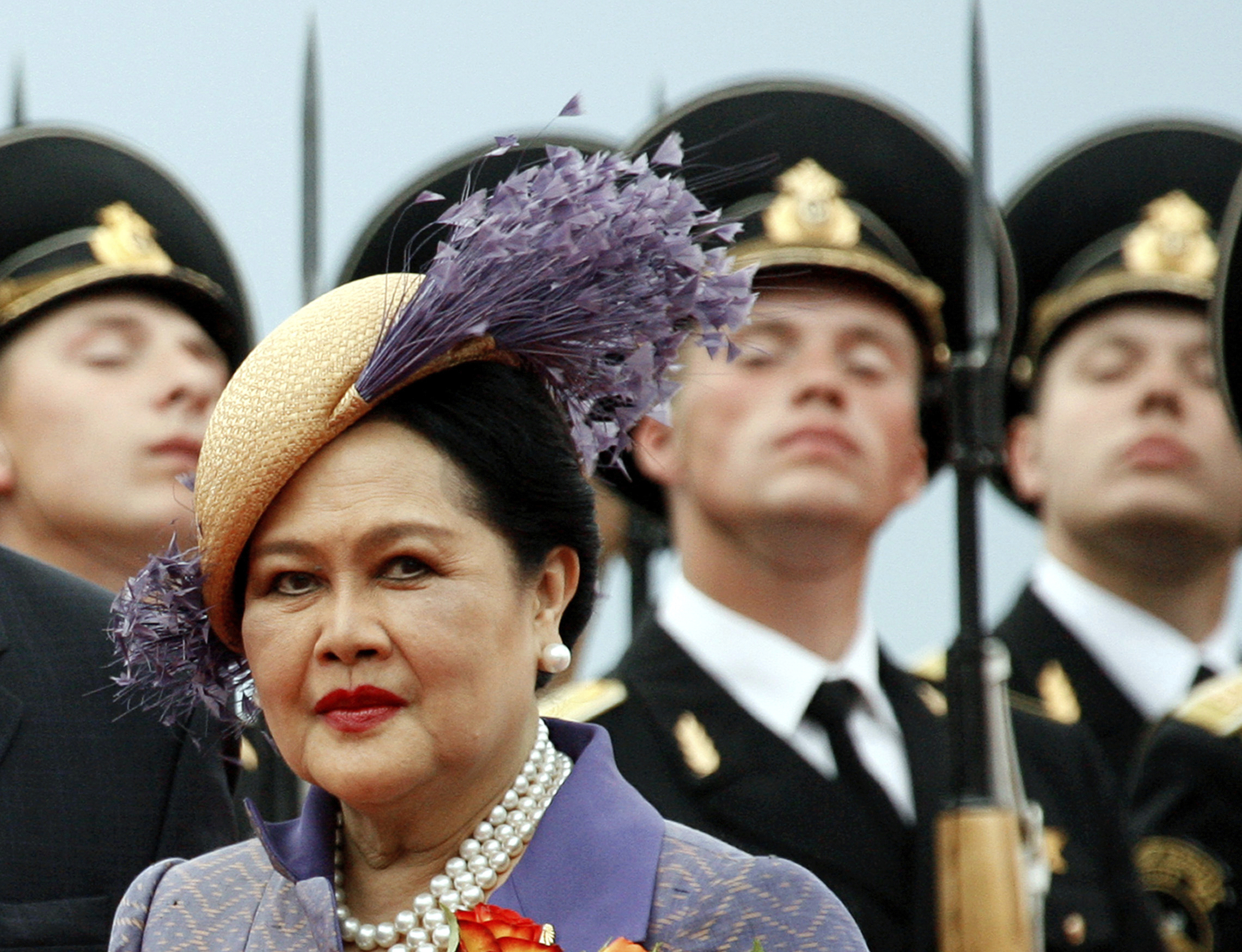 FILE - Queen Mother Sirikit passes by Russian honor guards while arriving in Moscow Vnukovo airport, July 2, 2007. (AP Photo/Misha Japaridze, File)