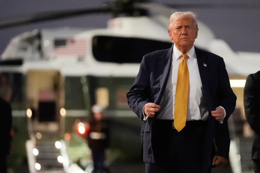 President Donald Trump arrives at Haneda Airport before switching his ride to Marine One in Tokyo, Japan, Monday, Oct. 27, 2025, following his visit at the ASEAN summit in Malaysia. (AP Photo/Mark Schiefelbein)