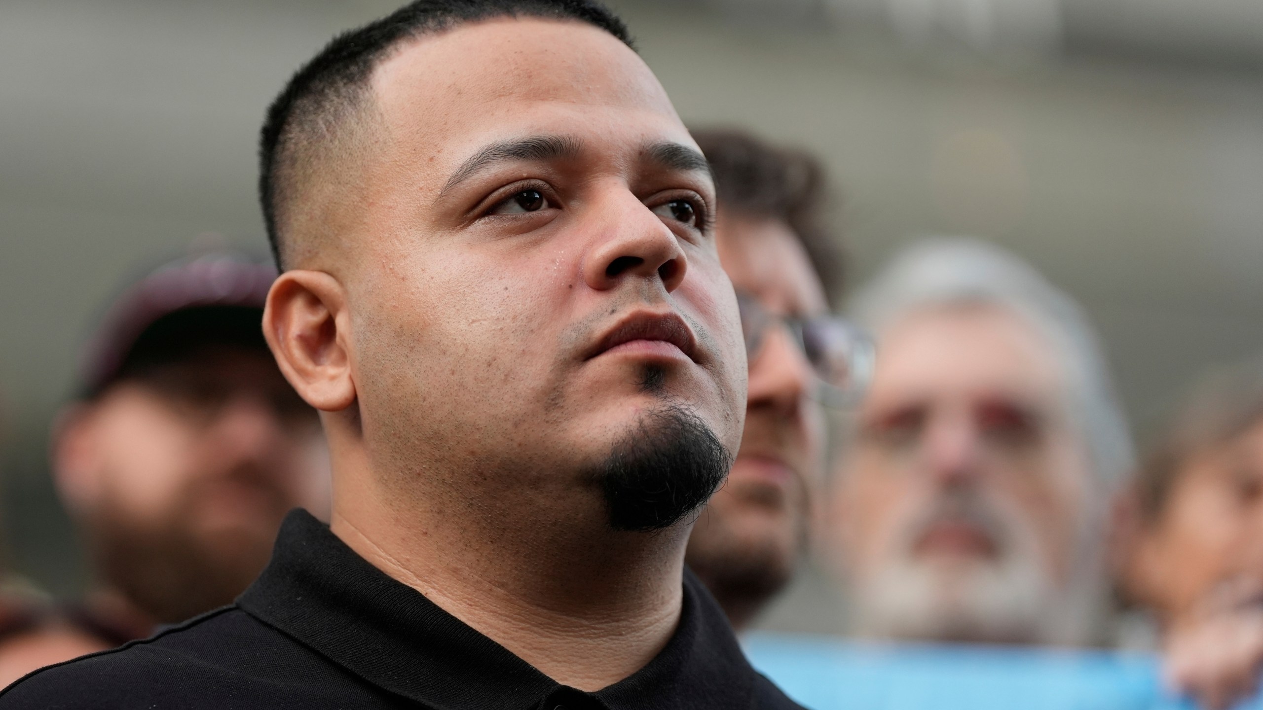 FILE - Kilmar Abrego Garcia attends a protest rally at the Immigration and Customs Enforcement field office in Baltimore, Aug. 25, 2025, to support Abrego Garcia. (AP Photo/Stephanie Scarbrough, File)