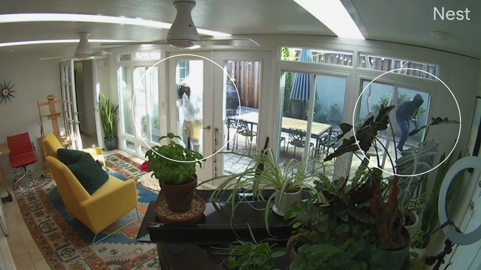 As the suspects entered a patio area, they peered through the glass doors and windows. (Lea Young)