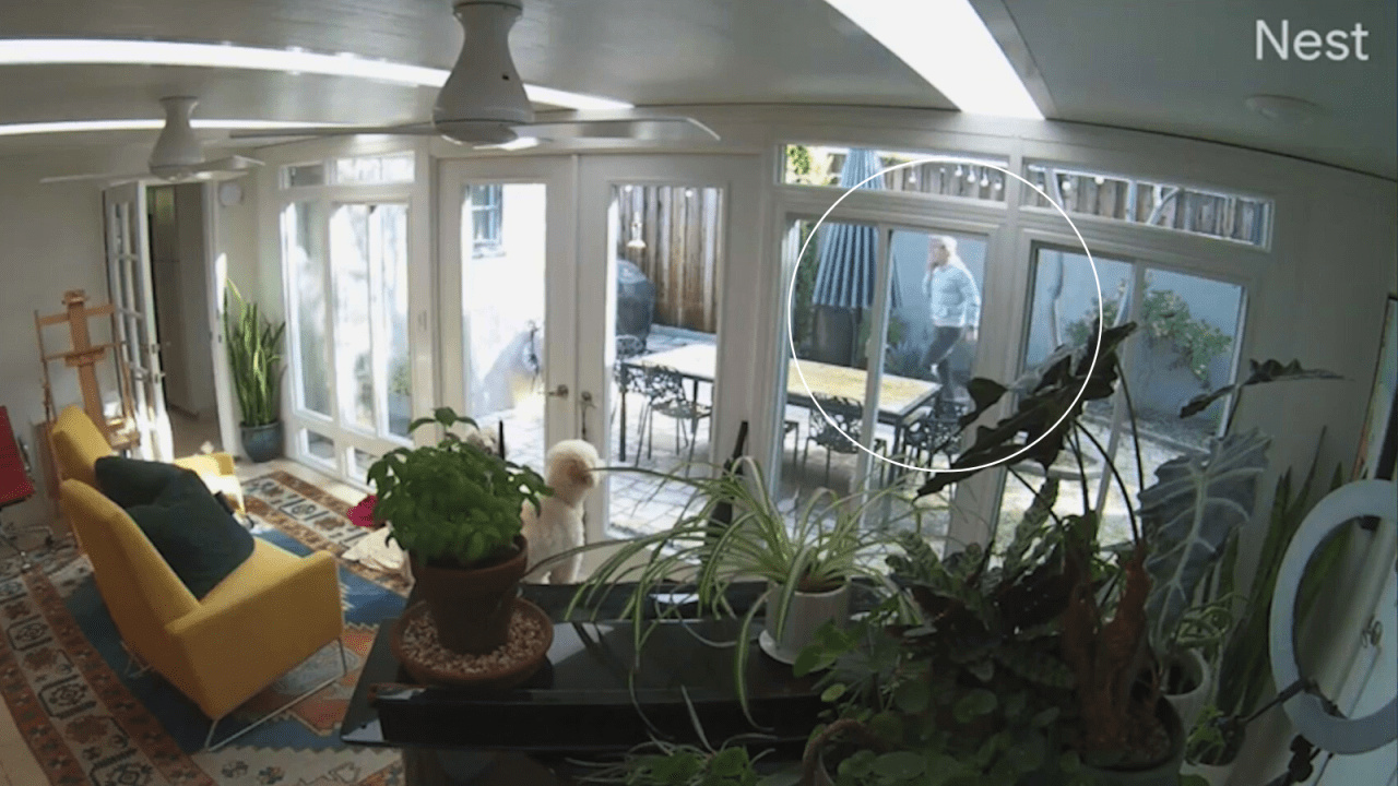 The homeowner running after the suspects after spotting them in his backyard. (Lea Young)