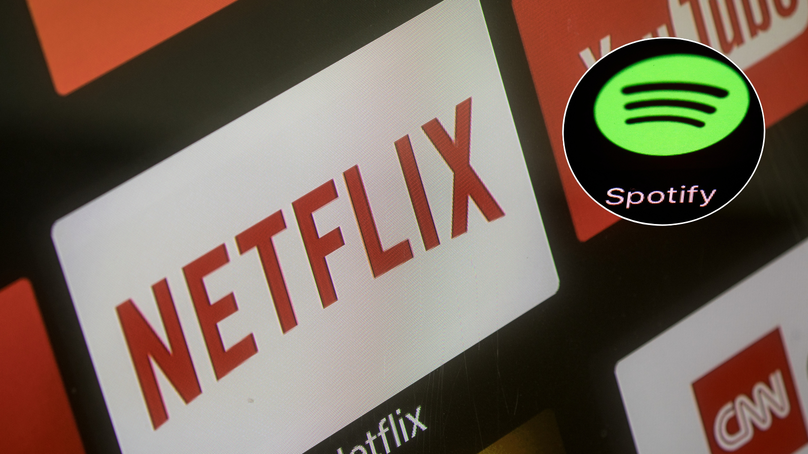 Netflix and Spotify announced a new partnership to bring 16 video podcasts—including The Bill Simmons Podcast, The Rewatchables, and Dissect—to Netflix starting in early 2026. (AP)