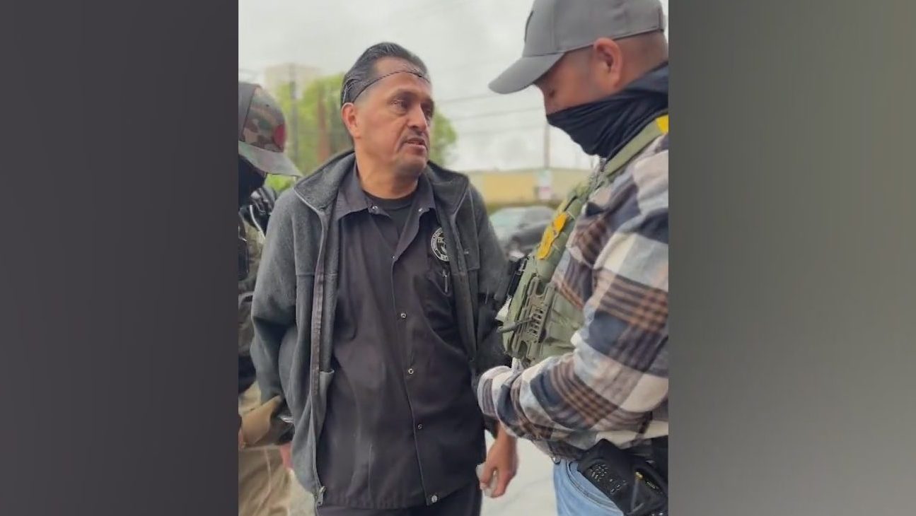 Eloy Marin is seen being detained by federal agents outside his job at a Wilmington cafe on Oct. 14, 2025. (Courtesy Wilmington Chronicles)