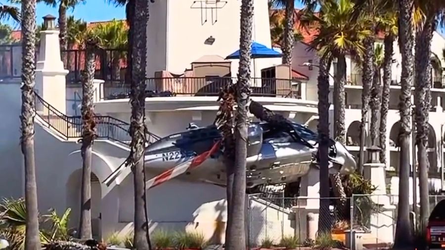 A helicopter is seen after crashing in Huntington Beach on Oct. 11, 2025. (Citizen.com)