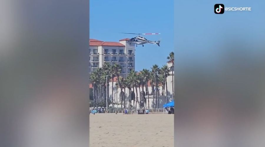 Several people were injured after a helicopter crashed onto a building in Huntington Beach on Oct. 11, 2025. (@sicshortie)