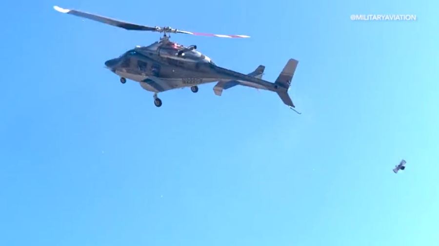 Video from a bystander showed the Bell 222 helicopter flying overhead moments before it crashed in Huntington Beach on Oct. 11, 2025. (@militaryaviation)