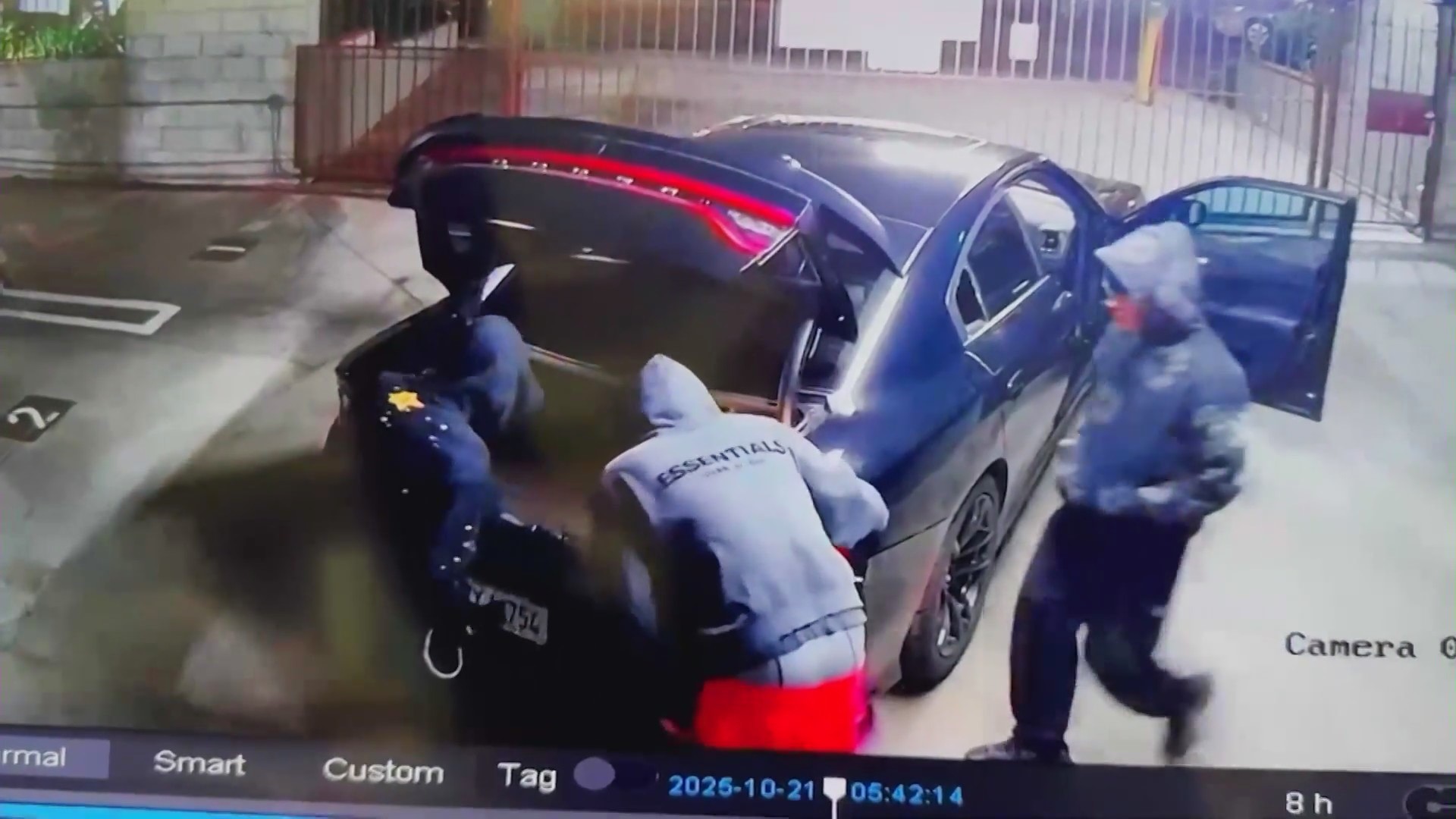 Surveillance cameras captured three suspects stealing a 2017 Dodge Charger Daytona 392 from the parking garage of a Studio City apartment complex on Oct. 21, 2025. (Stephan Wendel)